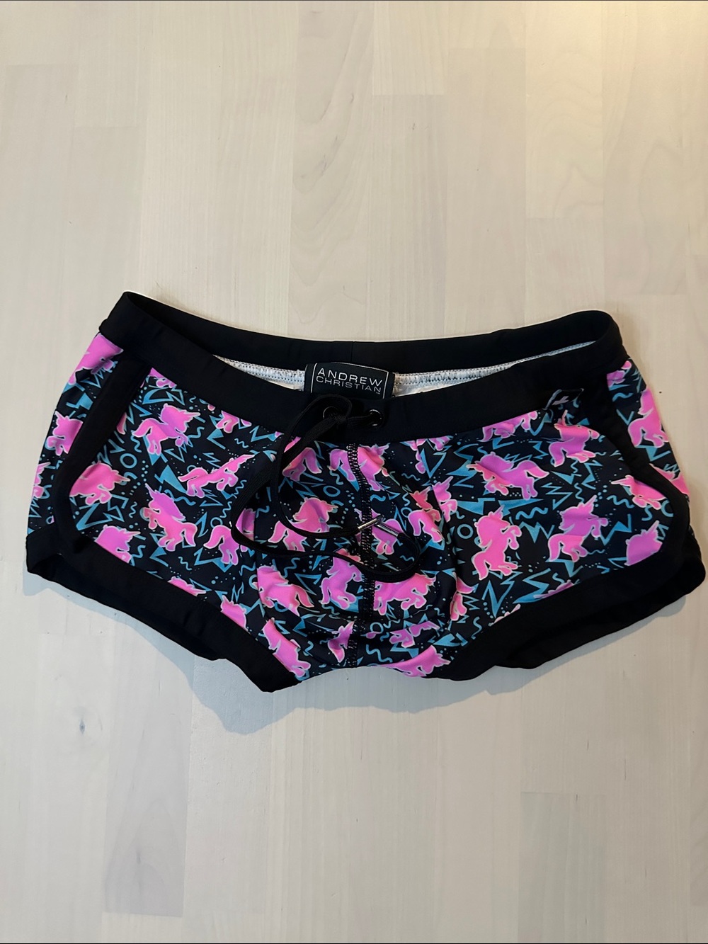 Andrew Christian Black Shorts with Pink Unicorns and Teal Accents